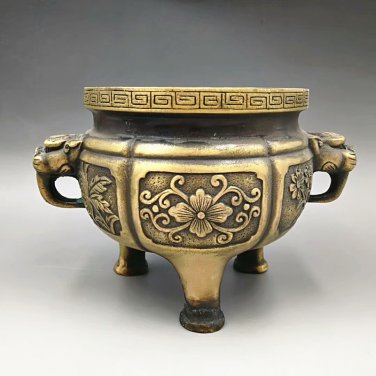 Copper and gold. Ancient temples and flowers with a double ear censer. The treasures of the town.