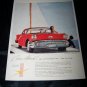 Vintage 1957 Oldsmobile Golden Rocket Holiday Print Ad