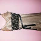 beige dress with black polkadot dress