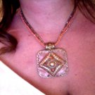 Coral and gold designer pendant and beaded necklace