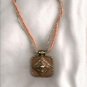 Coral and gold designer pendant and beaded necklace