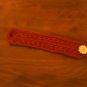 Merino wool crocheted bracelet daisy rust
