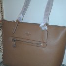 Coach large turnlock tote, saddle color
