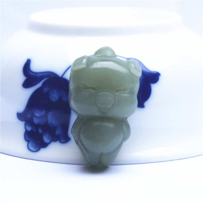 Hand-carved hetian jade cartoon pig jade pendant