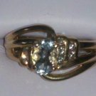 oval aquamarine in swirl mount Ring  R-1099