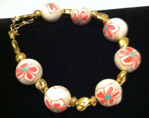 Floral cane style polymer clay bead bracelet