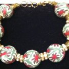 Green, red & white polymer clay bracelet