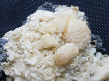 Stilbite on magnetite specimen