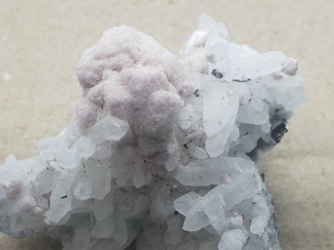 Beautiful Manganocalcite on quartz specimen