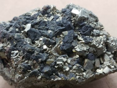 Chalcopyrite on pyrite specimen