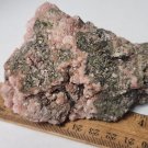 Beautiful Rhodochrosite with pyrite on quartz specimen Butte