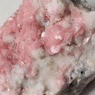 Beautiful Colorado Rhodochrosite on quartz specimen