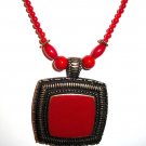 Red Bamboo Coral Beads with Antiqued GoldTone Pendant Necklace and Earrings Set