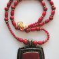 Red Bamboo Coral Beads with Antiqued GoldTone Pendant Necklace and Earrings Set