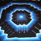 multi-colored blue & black afghan