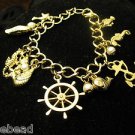 Nautical Beach Charm Bracelet Goldtone Anchor Sea Horse Wheel Fish Pearls Shell