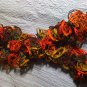 Frilly knit autumn colored scarf