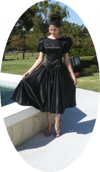 Timeless Vintage: Black Satin Dancing Dress with Stunning White Bows for Accents, Party Ready!