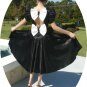 Timeless Vintage: Black Satin Dancing Dress with Stunning White Bows for Accents, Party Ready!