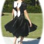 Timeless Vintage: Black Satin Dancing Dress with Stunning White Bows for Accents, Party Ready!