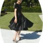 Timeless Vintage: Black Satin Dancing Dress with Stunning White Bows for Accents, Party Ready!
