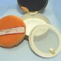 Vintage Round Gold Tone Compact with Dainty Flowers Etched on Top, Black Enamel Accents