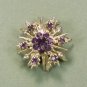 *Sunburst-shaped Soft Goldtone Brooch Sparked with Pretty Purple Rhinestones