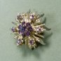 *Sunburst-shaped Soft Goldtone Brooch Sparked with Pretty Purple Rhinestones