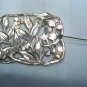 Pretty Rectangular Antique Brooch Done in Graceful Curves of Leaves and Flowers