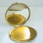 Vintage Round Volupte Compact: NOS, Beautiful Silvertone with Goldtone Stars
