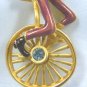 Daredeveil Unicyclist (Clown Perhaps?) Wheels By on Goldotned Bob Mackie Pin w/RS
