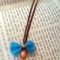 Bow necklace - Turquoize Satin Ribbon Bow And Peach Pearl Necklace