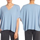 $138 Eileen Fisher V-Neck Jersey Asymmetrical Hem Top XSmall 0 2 Water Blue Viscose Jersey $138 Eileen Fisher V-Neck Jersey Asymmetrical Hem Top XSmall 0 2 Water Blue Viscose Jersey