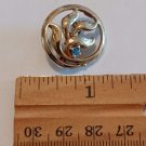 Gold Tone Almost Round with a Blue Stone and Leaf In Center Pin/Brooch