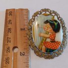 Porcelain Little Girl in Red and White Dress Playing a Harp Made in Western Germany Pin/Brooch