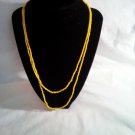 Yellow Seed Bead Necklace with a few Glass Beads