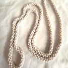 Several Strands of Off White Beads Entwined Necklace (BD1)