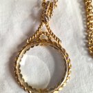 Vintage Gold Round Magnifying Glass Necklace 1 1/2" Diameter Chain 18 1/2" latched (BD1) Vintage Gold Round Magnifying Glass Necklace 1 1/2" Diameter Chain 18 1/2" latched (BD1)