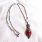 Dark Red Oval Coral in a Silver Tone Pendant Necklace (BD2)