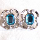 Silver Tone with Rectangle Cut Light Blue Stone in Center Pierced Earrings (BD2) Silver Tone with Rectangle Cut Light Blue Stone in Center Pierced Earrings (BD2)