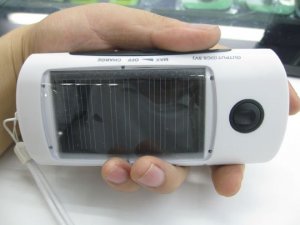 Wholesale Solar 4LED Torch Flashlight with FM Radio Phone Charger