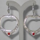 “Wicked” Sterling silver heart hoop earrings.