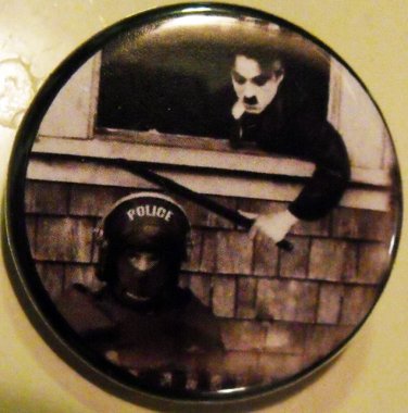 CHARLIE CHAPLIN BOPS A COP pinback button badge 1.25"