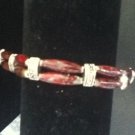 red acrylic tribal style bracelet