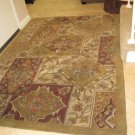 Beautiful 5 x 8 rug- greens, purples, golds