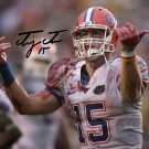 TIM TEBOW SIGNED PHOTO 8X10 RP AUTOGRAPHED FLORIDA GATORS FOOTBALL TIM TEBOW SIGNED PHOTO 8X10 RP AUTOGRAPHED FLORIDA GATORS FOOTBALL