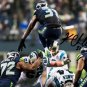 * KAM CHANCELLOR SIGNED PHOTO 8X10 RP AUTOGRAPHED SEATTLE SEAHAWKS JUMP