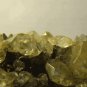 Shiny pyrite fossil mineral specimen with big gem crystals of clear calcite