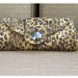 The Raquel Clutch a Sleek Design in a Leopard Print