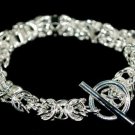 SB026 STERLING SILVER PLATED RINGS CHARM BRACELET